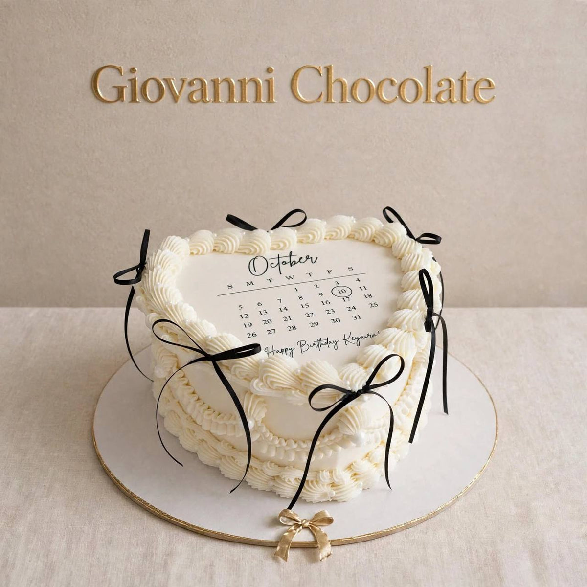 Heart calendar cake with black bows | GC-48