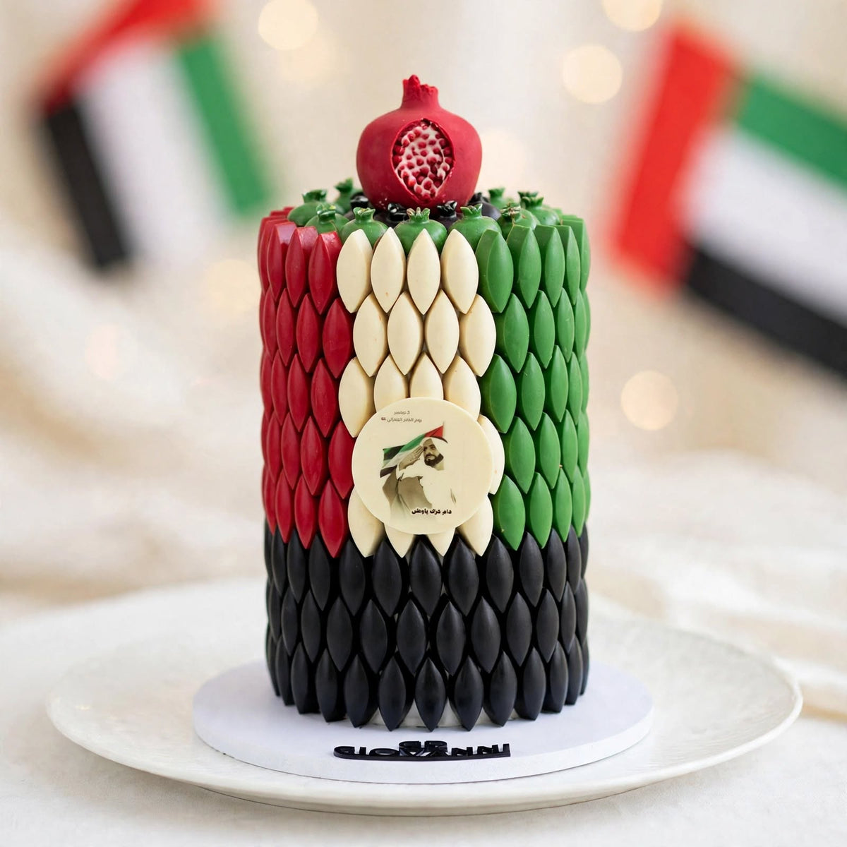 هرم برج بيزا مع حبة الرمان بألوان العلم | UAE Flag Pisa Tower Pyramid with Pomegranate Chocolate