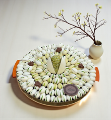 Luxury Stainless Steel Platter — Pistachio Praline, Kunafa & Grand Chocolate Egg صحن ستانلس ستيل فاخر — حبة الفستق والكنافة وبيضة الشوكليت الملكية