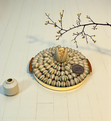 Luxury Stainless Steel Platter — Pistachio Praline, Kunafa & Grand Chocolate Egg صحن ستانلس ستيل فاخر — حبة الفستق والكنافة وبيضة الشوكليت الملكية