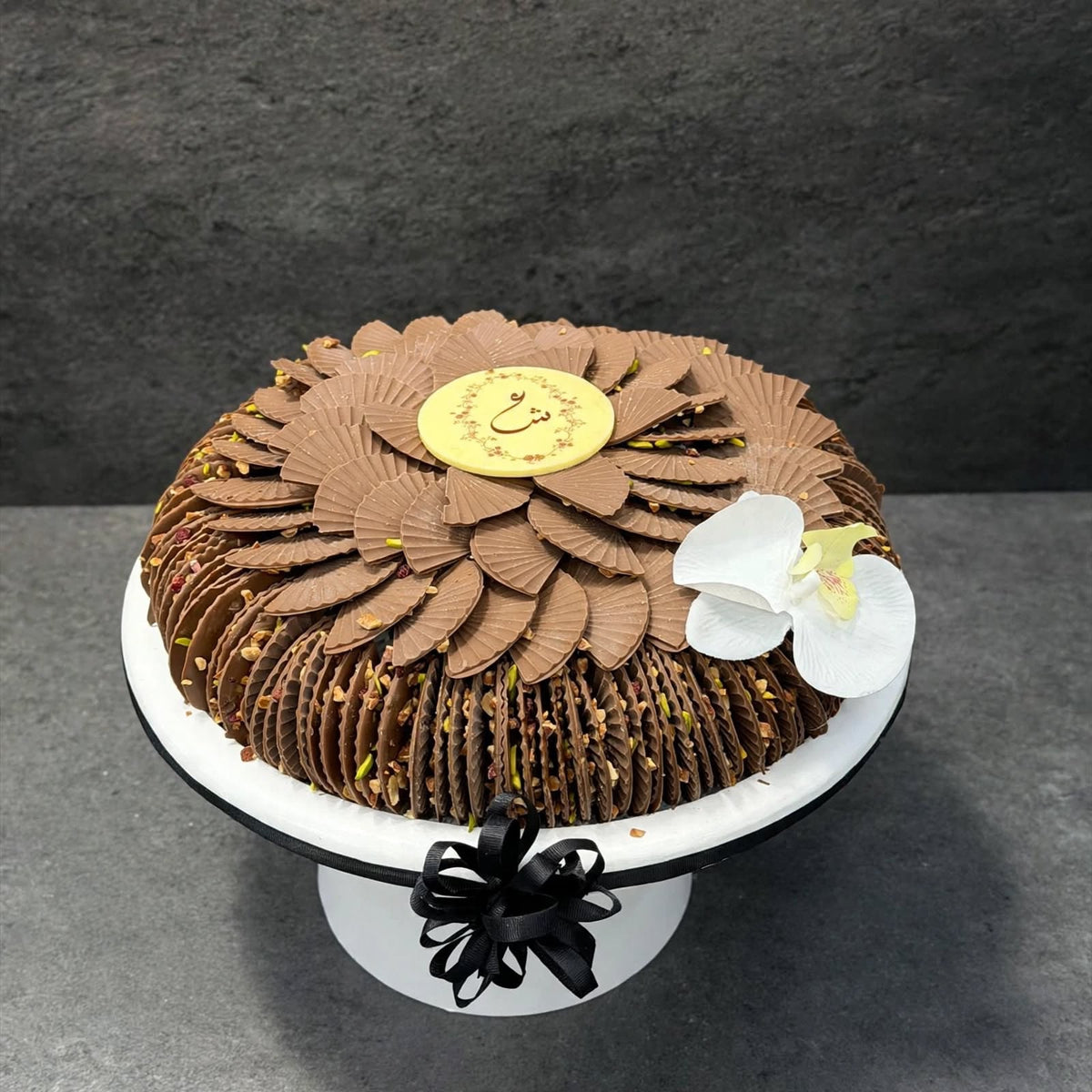 ستاند أبيض – شوكليت المروحة بالسمسم | White Stand – Sesame Fan Chocolate