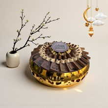 Elegant Stainless Steel Platter with Wrapped Chocolates صحن ستانلس ستيل راقي مع شوكليت مغلّف