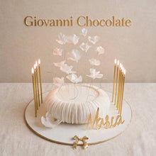 White ruffle cake with gold candles and a custom name | GC-42