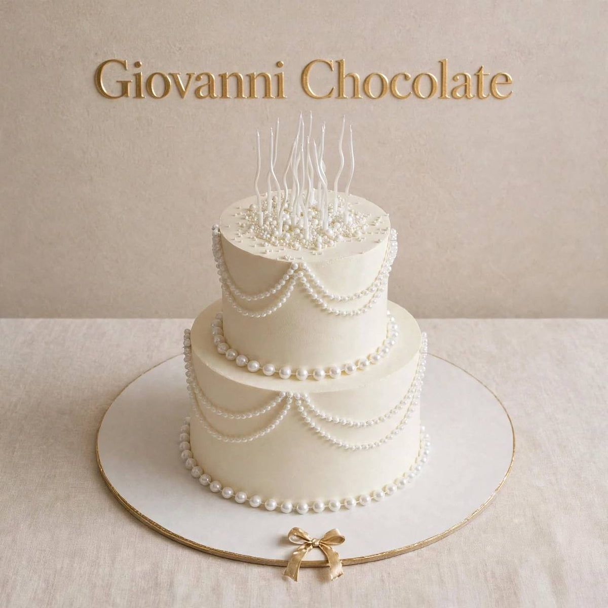Two-tier white wedding cake with pearls | GC-62