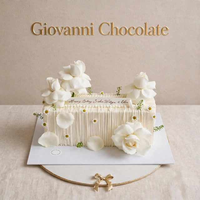White floral cake for elegant celebrations – Giovanni Chocolate UAE
