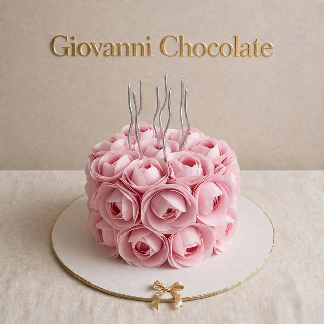 Pink rosette cake with silver candles – Giovanni Chocolate UAE