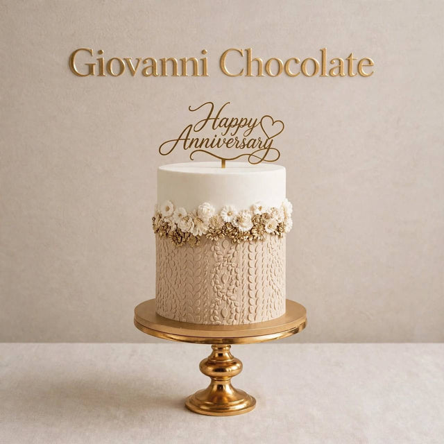 Beige anniversary cake on a gold stand – Giovanni Chocolate UAE